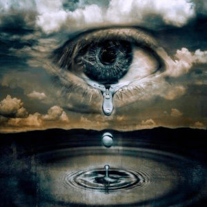 A tear drops falling from the sky to an eye.
